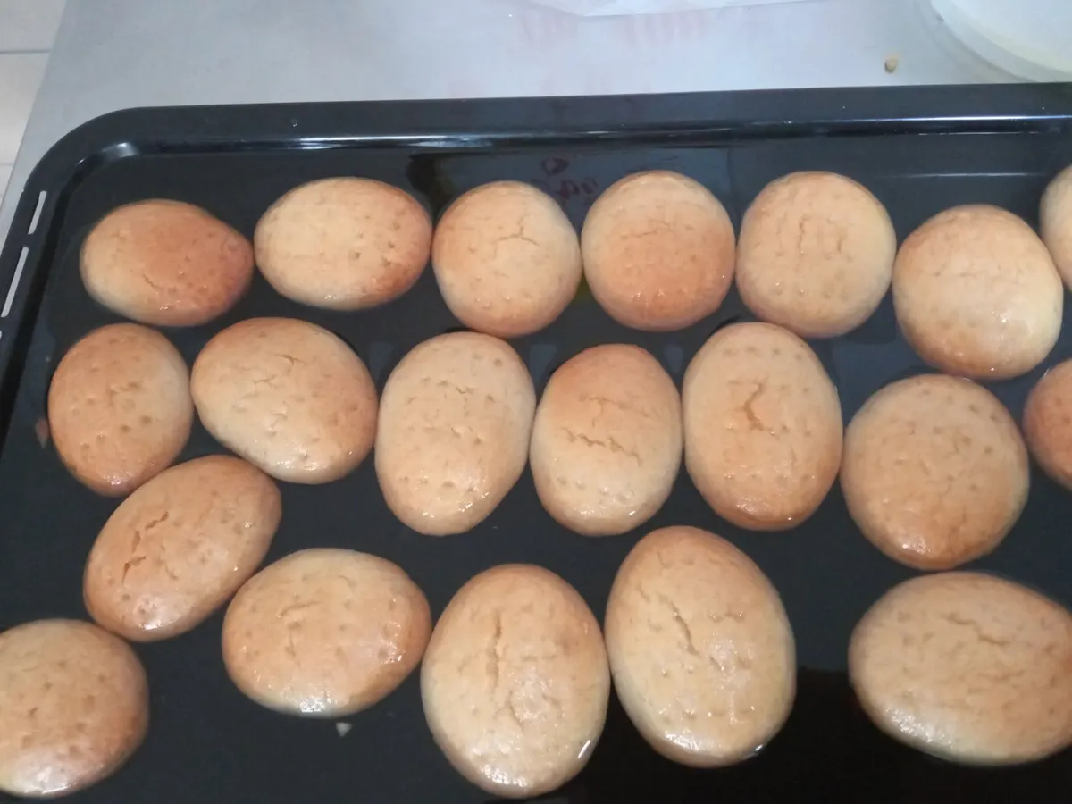 Hurmasice — golden syrup-soaked cakes fresh from the oven