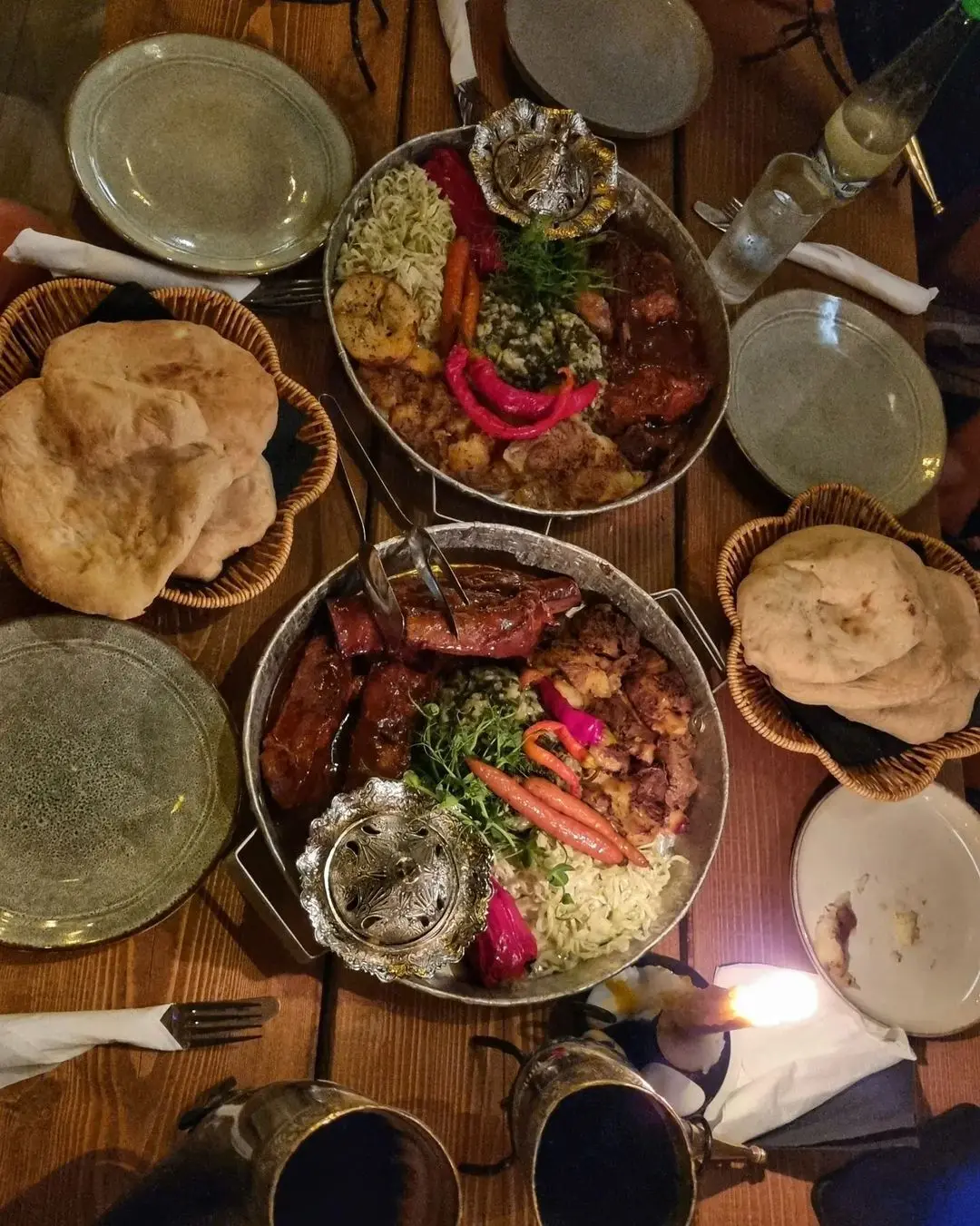 Traditional Bosnian feast spread at Timber & Stone Tavern